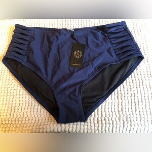 RELLECIGA Deep Navy Swimwear Tag on Navy Fabric